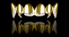 Gold and diamond grillz