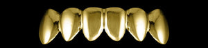 Gold and diamond grillz