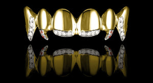 Gold and diamond grillz